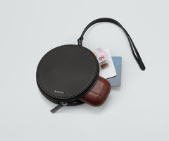 The Circle Zip Pouch in Jet Black