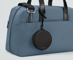 The Circle Zip Pouch in Jet Black