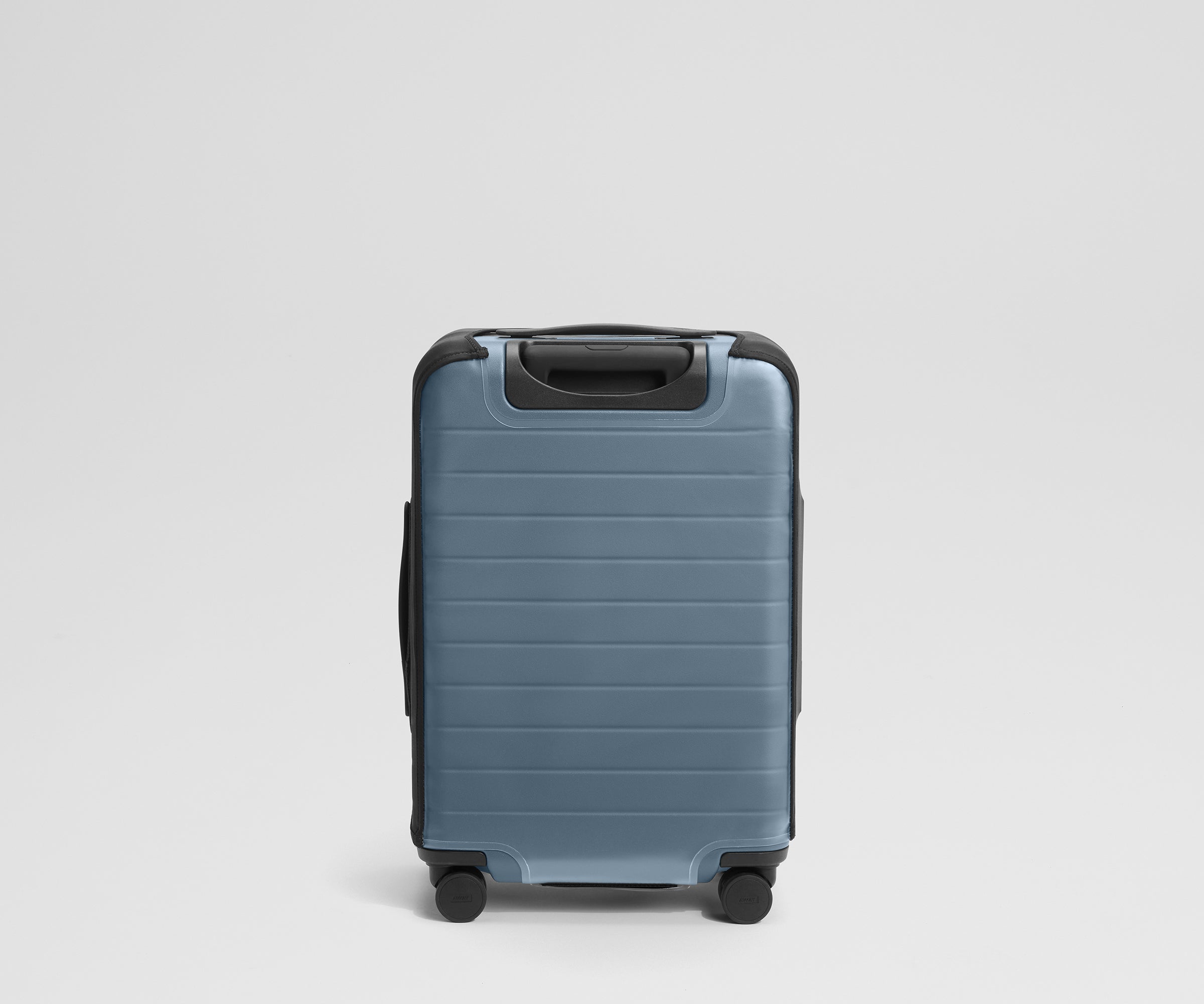 Clear Luggage Cover in The Bigger Carry-On