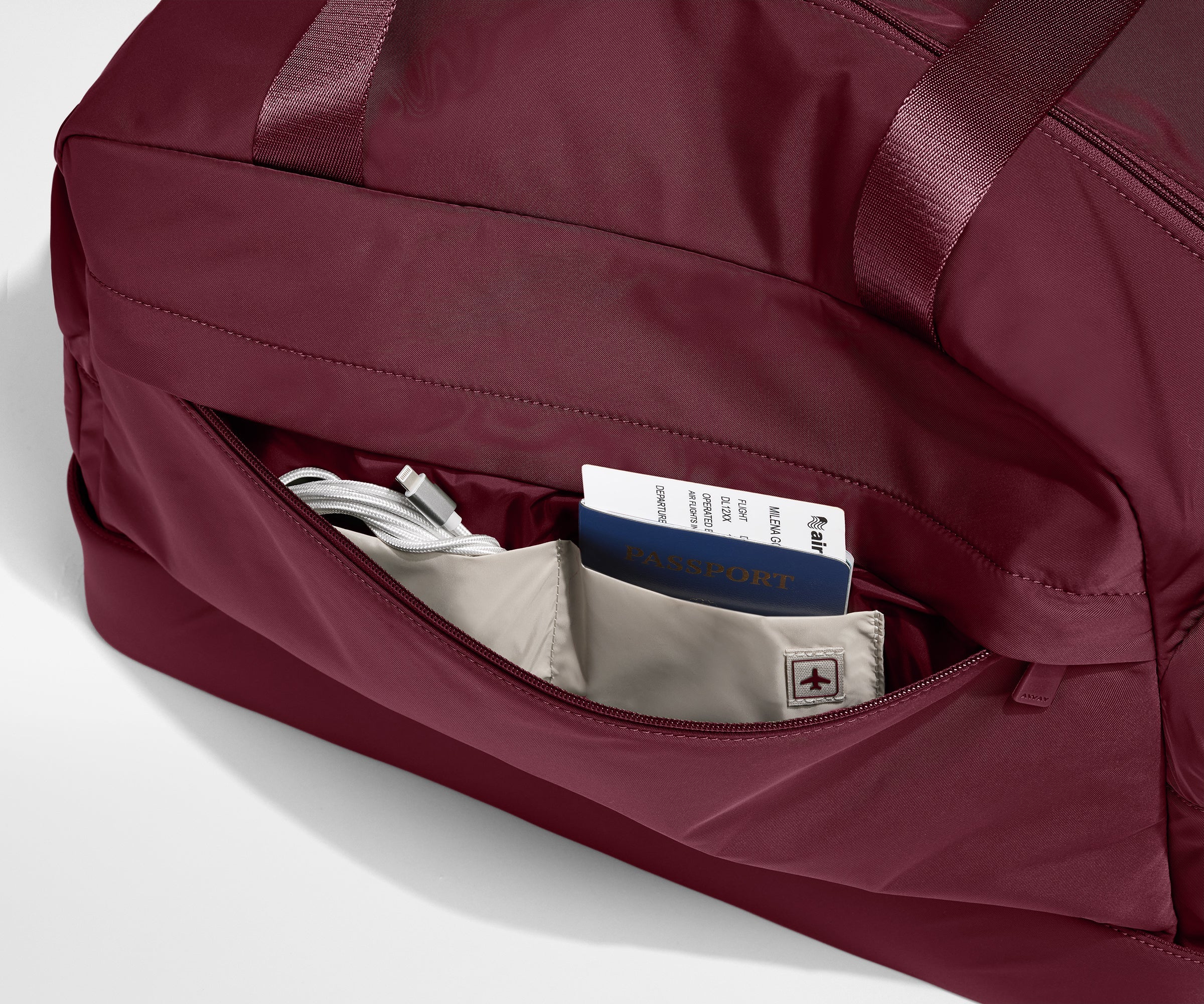 Featherlight Weekender in Ruby Haze