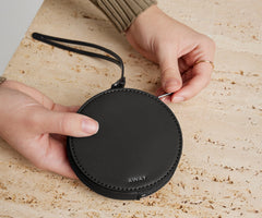 The Circle Zip Pouch in Jet Black