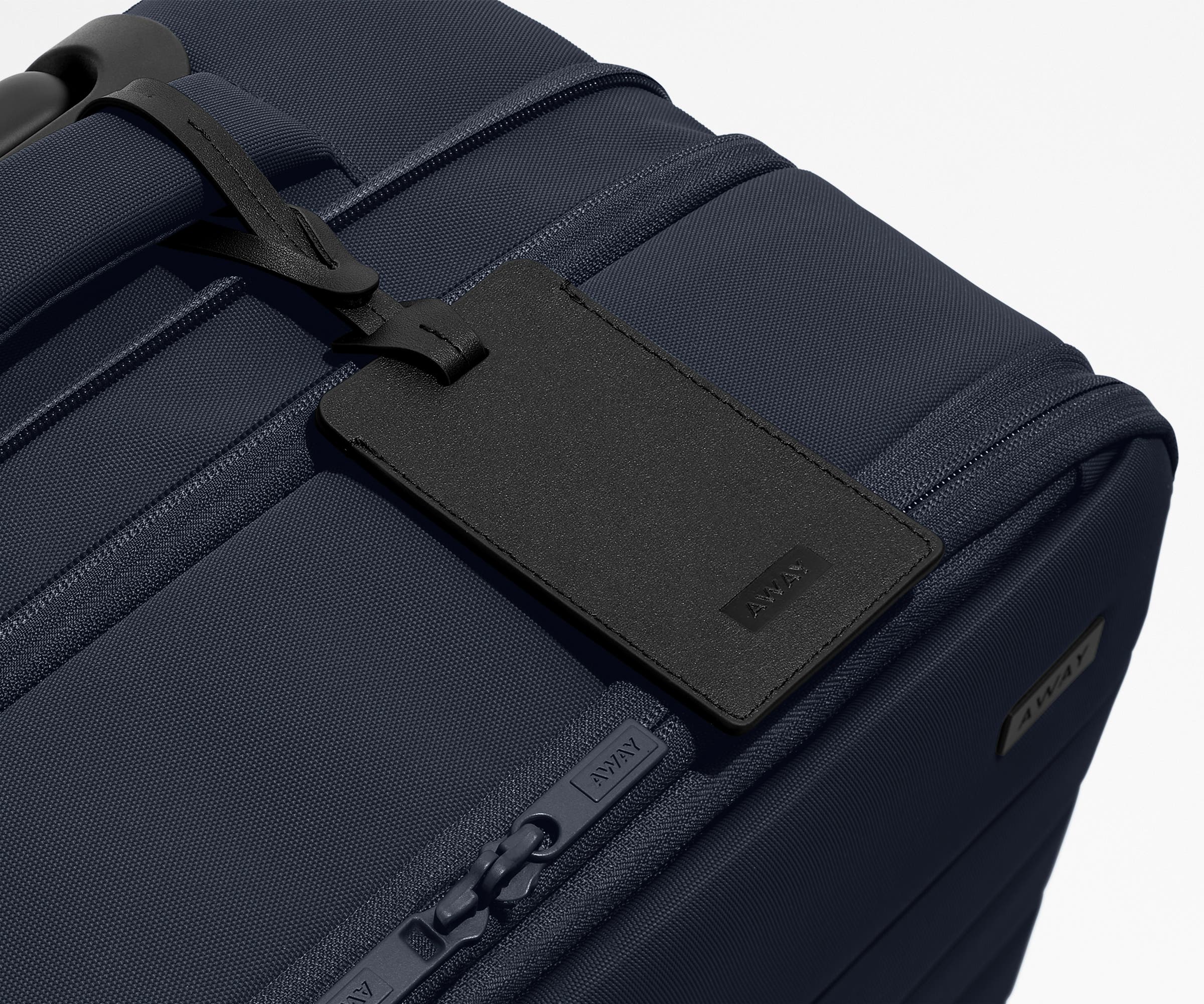 Softside Bigger Carry-On in Navy Blue